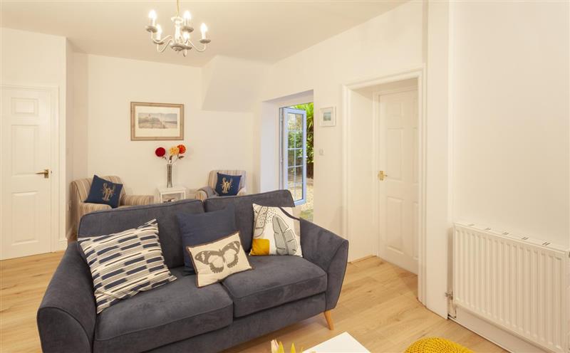 Relax in the living area at Beachside Cottage, Minehead