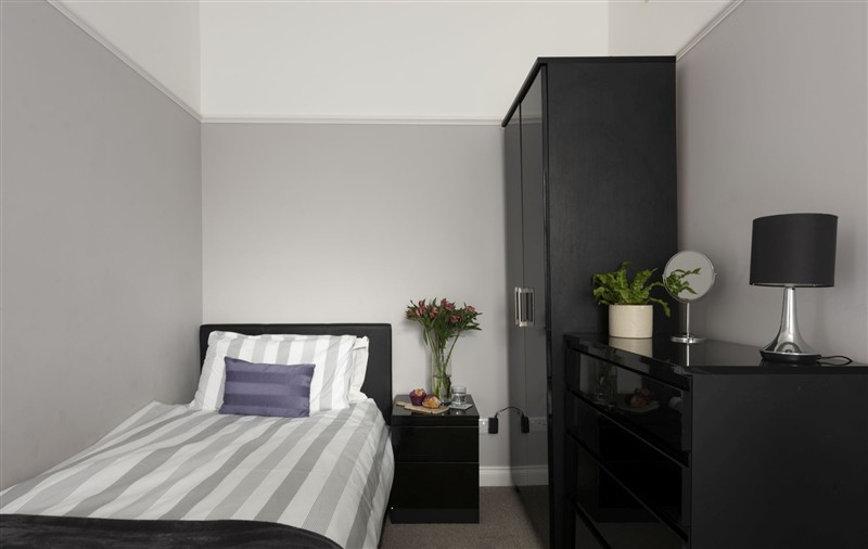 A photo of the bedroom at Beachside Fistral, Cornwall