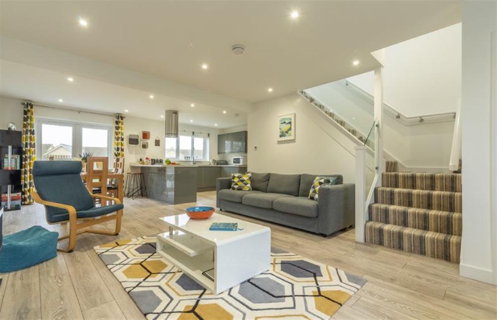 Open-plan sitting room, dining area and kitchen at Beacon View, St Agnes 