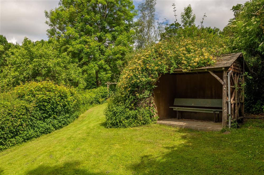 Escape the heat of the sun in the  viewing shelter in the garden at Beadale Cottage, Ampleforth