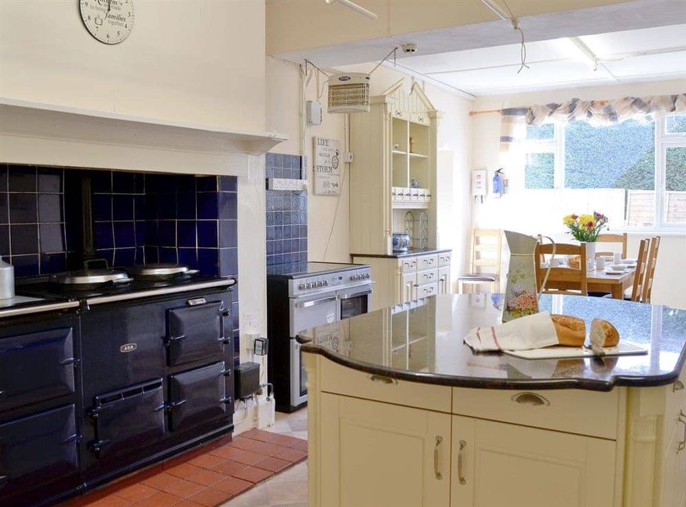 Very well equipped kitchen with a quintessential Aga at Beaford House in Beaford, near Winkleigh, Devon