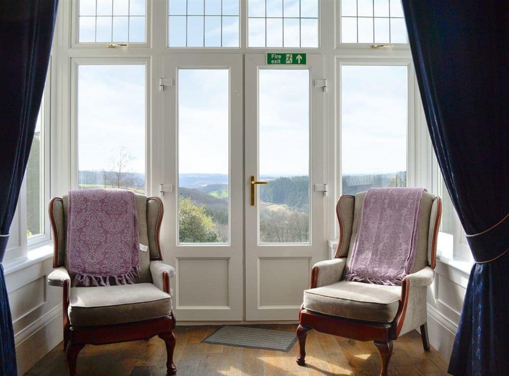 View out towards the surrounding countryside, from the living room at Beaford House in Beaford, near Winkleigh, Devon