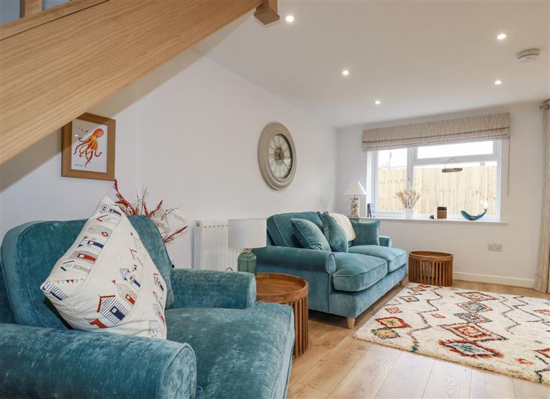 Relax in the living area at Beagle Cottage, Fraddon
