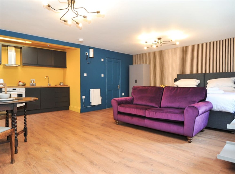 Open plan living space at Beale Apartment in Cheltenham, Gloucestershire