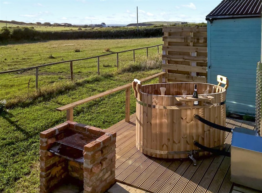 Hot tub at Beas Shepherds Hut in Llanfaethlu Nr Church Bay, Gwynedd