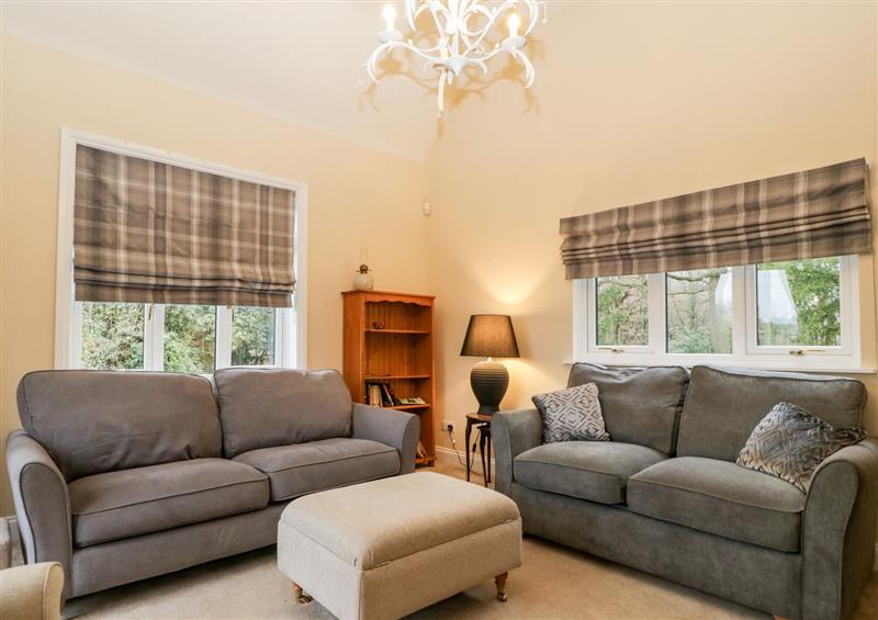 Relax in the living area at Beau Cottage, Bewdley