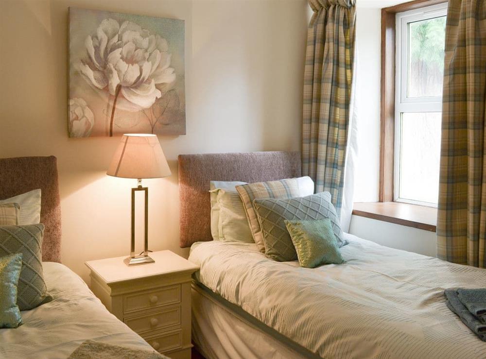 Comfortable twin bedroom at Nursery Cottage, 