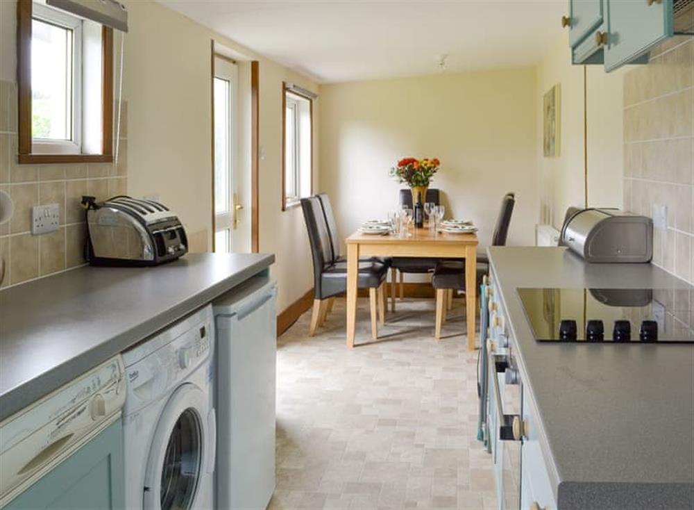 Convenient dining area within kitchen at Nursery Cottage, 