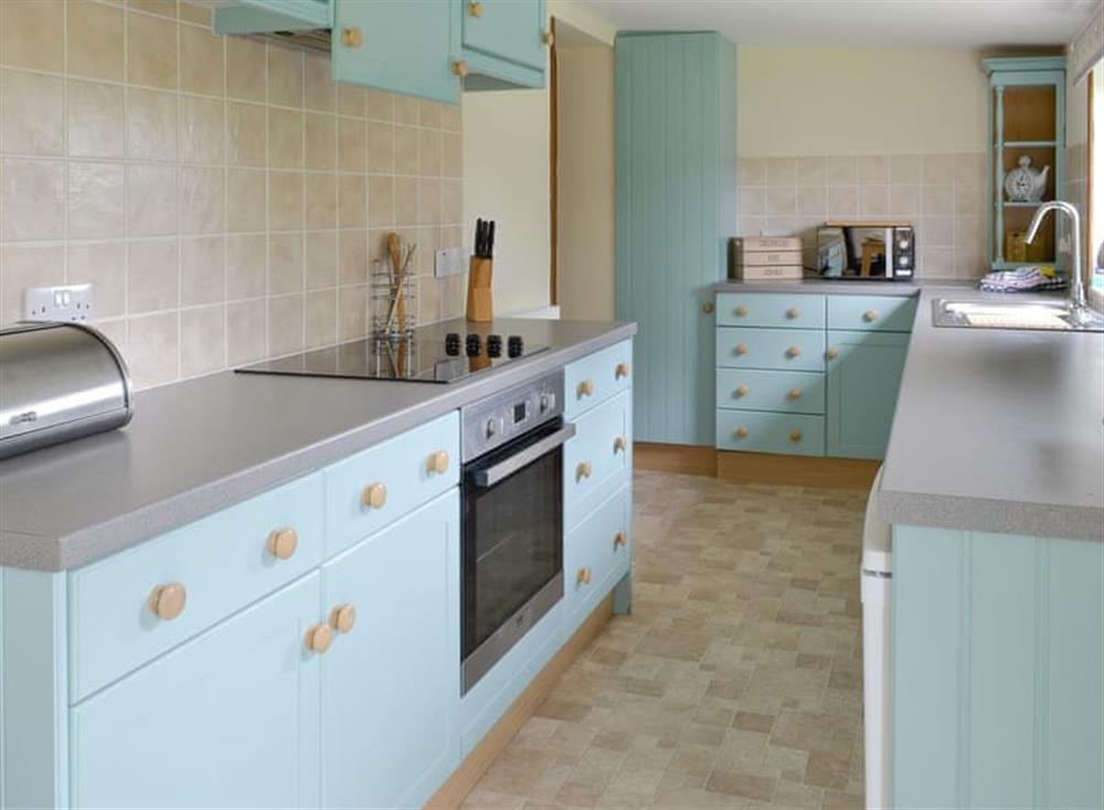 Well-equipped fitted kitchen at Nursery Cottage, 