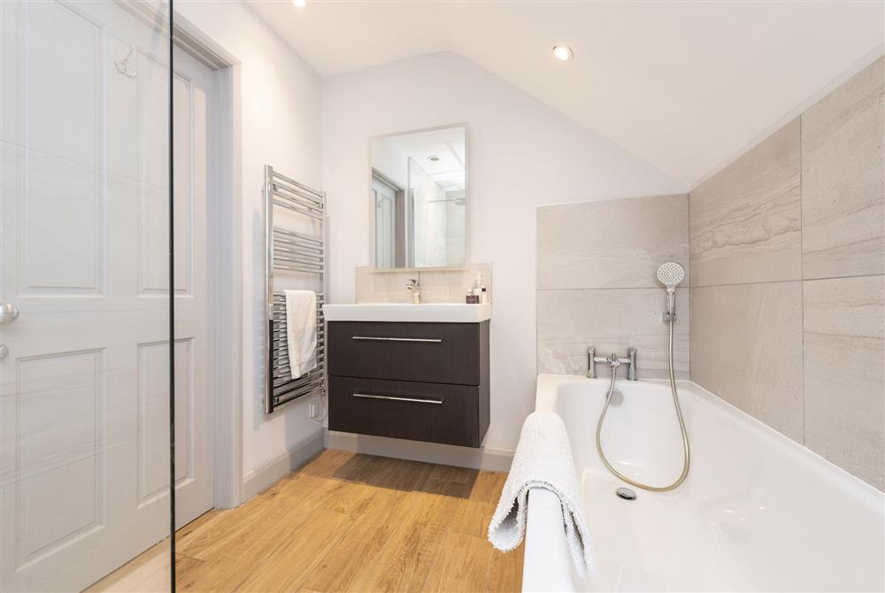 En-suite bathroom with separate shower enclosure at Beauvoir Court Stables, Dorchester