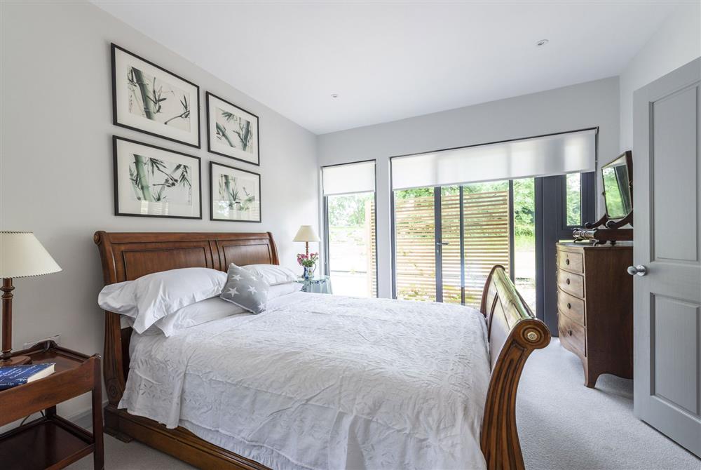 Master king bedroom with en-suite at Beauvoir Court Stables, Dorchester