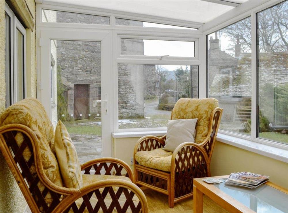 Light and airy conservatory at Beck Cottage in Croasdale, near Ennerdale Lake, Cumbria