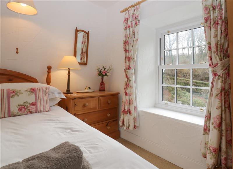 A bedroom in Beck Cottage at Beck Cottage, Satterthwaite