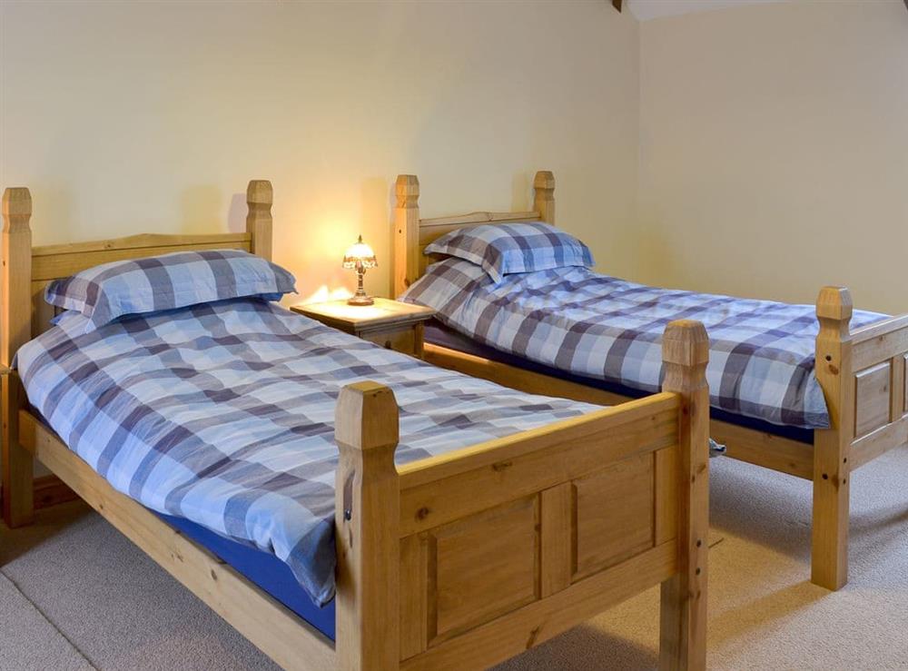 Cosy twin bedroom at Beckaveans Granary, 