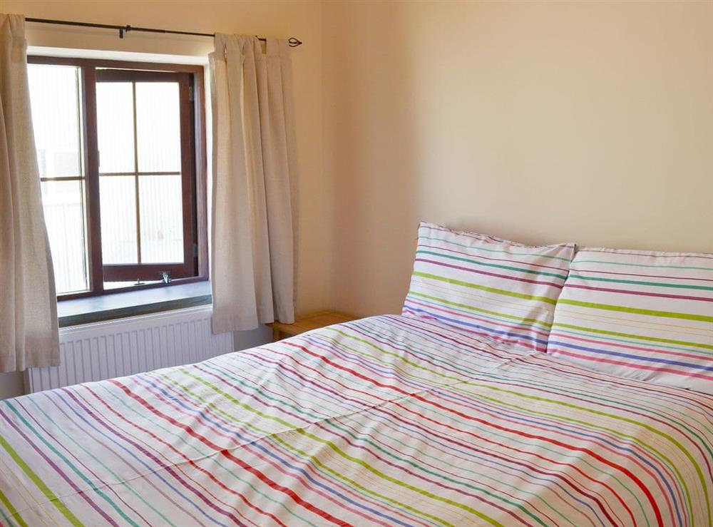Comfortable double bedroom at Beckaveans Stable, 