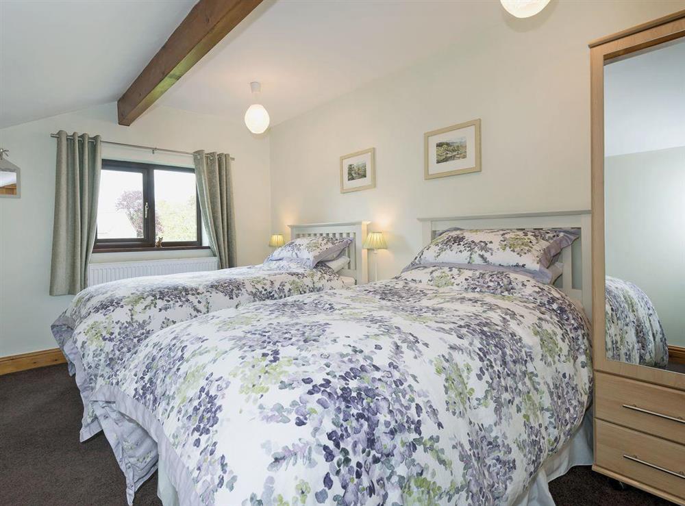 Cosy twin bedroom at Beckside Cottage in Orton, near Appleby, Cumbria