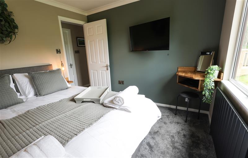 This is a bedroom at Bedale View Lodge, Wykeham near East Ayton