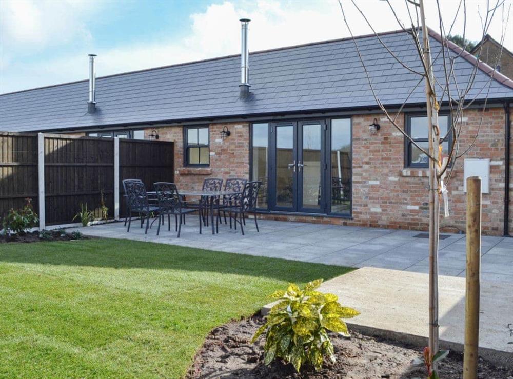 Lovely single storey barn conversion with wonderful part-lawned garden at The Old Dairy, 