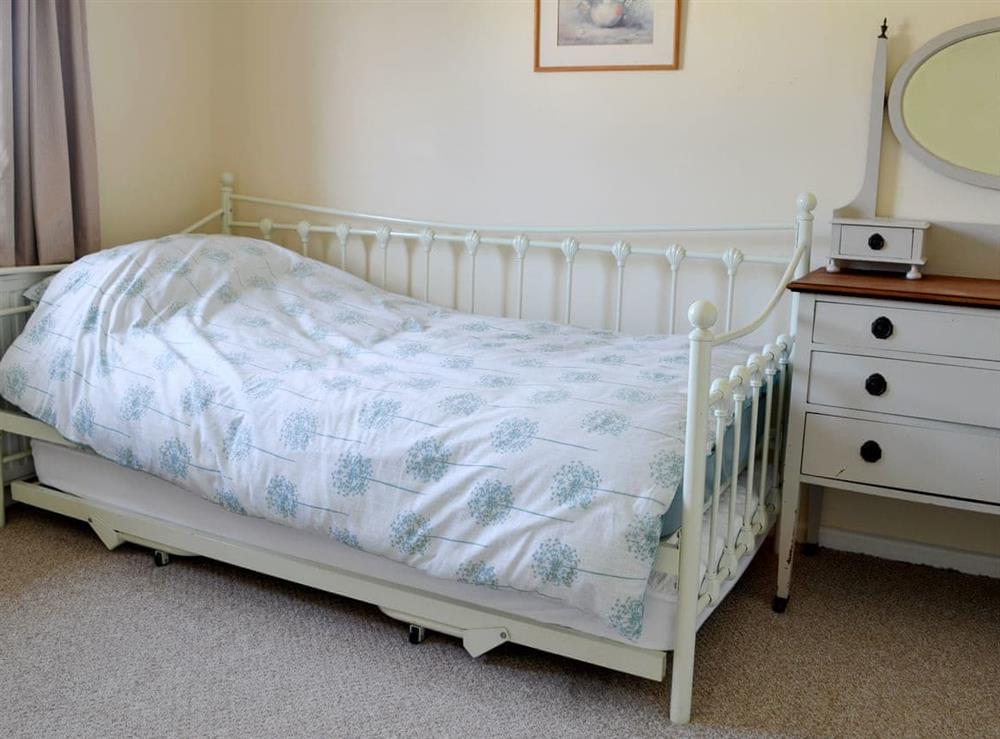 Bedroom 3 with single pull-out bed and single day bed at Bedford Mews in Sheringham, Norfolk