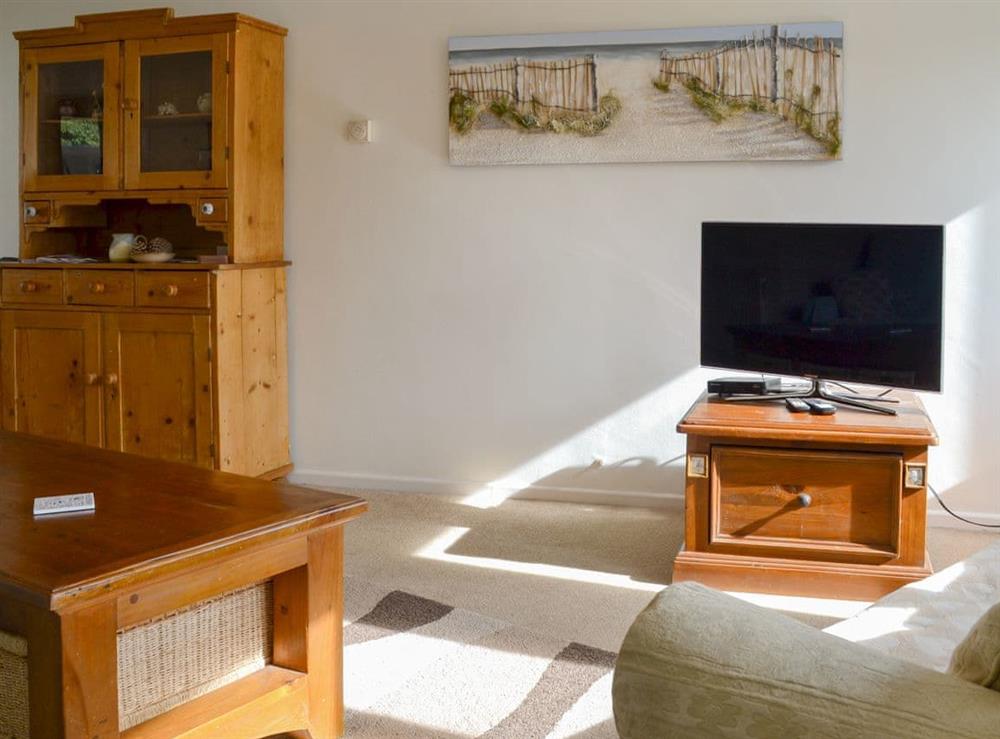Comfortable living room/ dining room at Bedford Mews in Sheringham, Norfolk