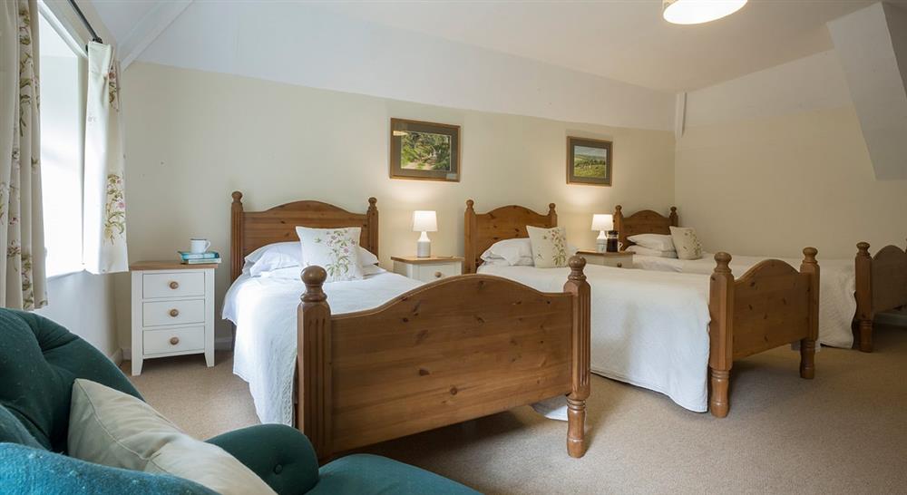 The triple bedroom at Beech Cottage in Bridport, Dorset