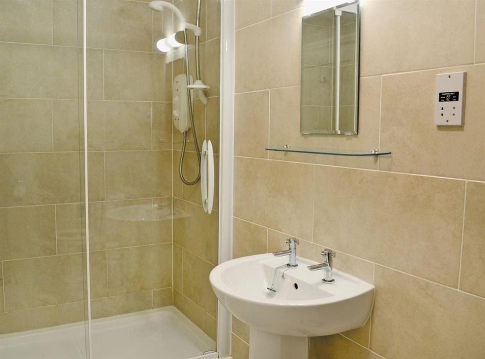 Fully tiled en-suite shower room and toilet at Beech Cottage in Crawfordjohn, Nr Biggar, S. Lanarkshire., Great Britain
