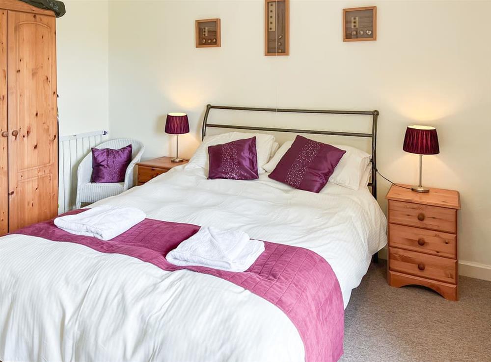King-size bedroom at Beech Cottage in Hartington, Derbyshire
