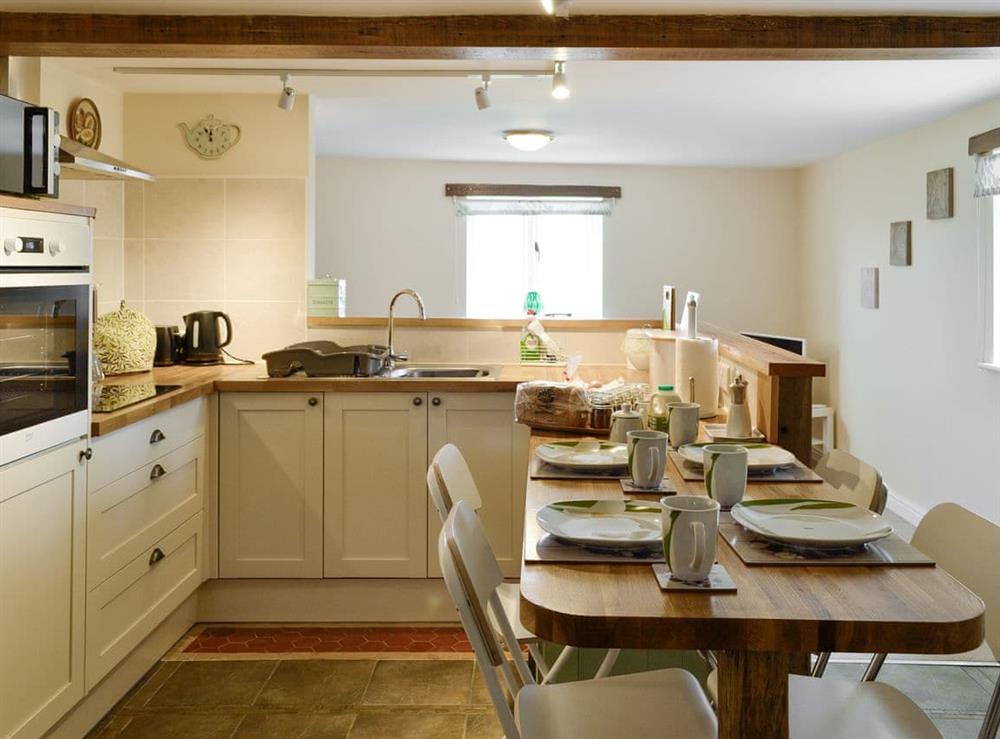 Fully appointed kitchen and dining space at Beech Cottage in Llanrhaeadr, near Denbigh, Denbighshire