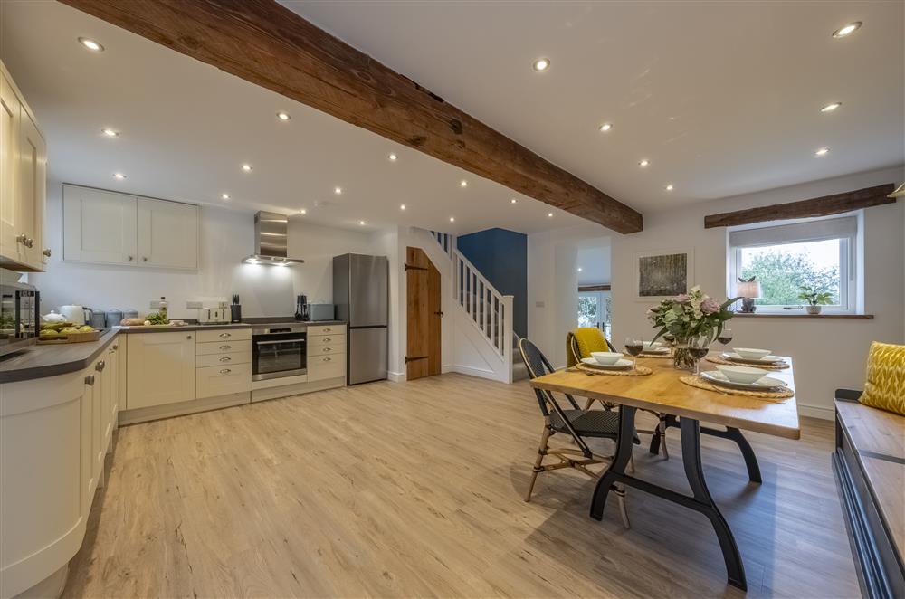 The open-plan kitchen and dining area at Beech Farm Barns, Buxton