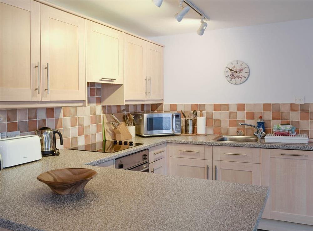 Well-equipped fitted kitchen at Beech Ghyll in Ambleside, Cumbria