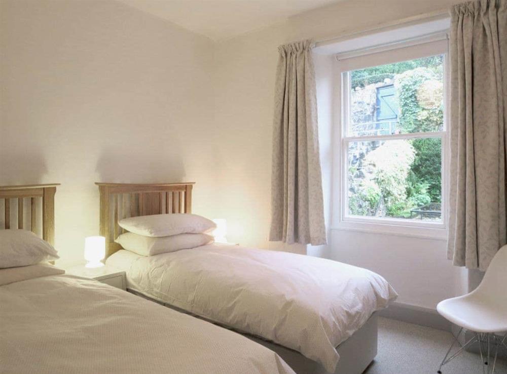 Charming twin bedroom with garden view at Beech Hill Terrace in Kendal, Cumbria