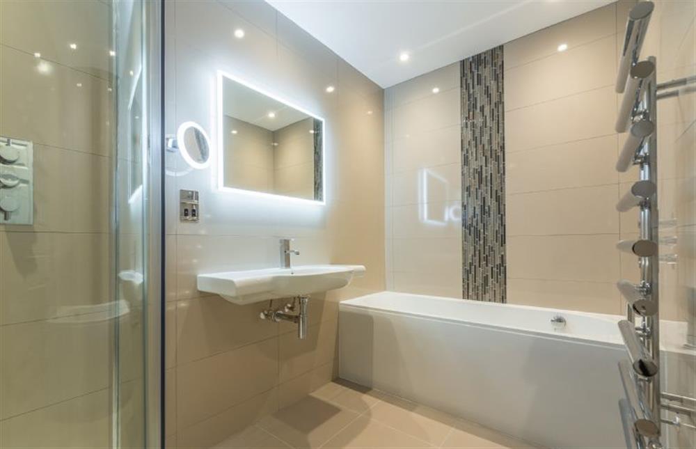 Ground floor: En-suite bathroom has bath and separate shower at Beech House, Little Walsingham