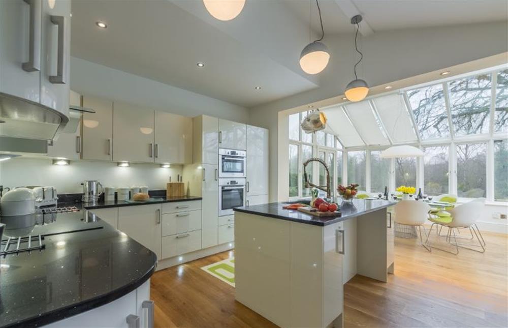 Ground floor: Lovely well-equipped kitchen with dining conservatory at Beech House, Little Walsingham