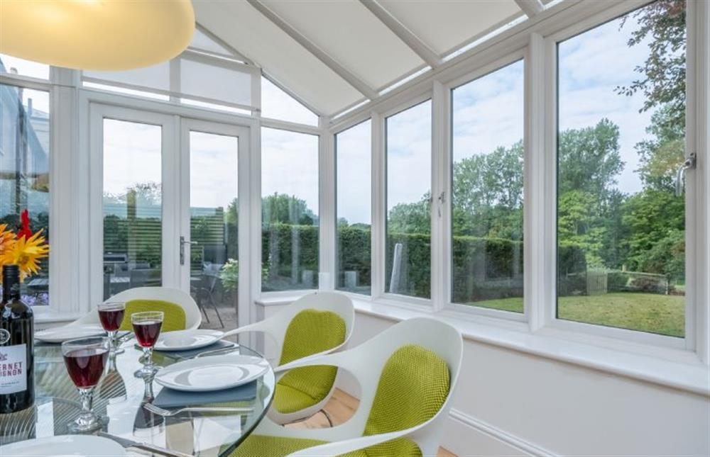 Ground floor: The conservatory opens onto a large patio at Beech House, Little Walsingham