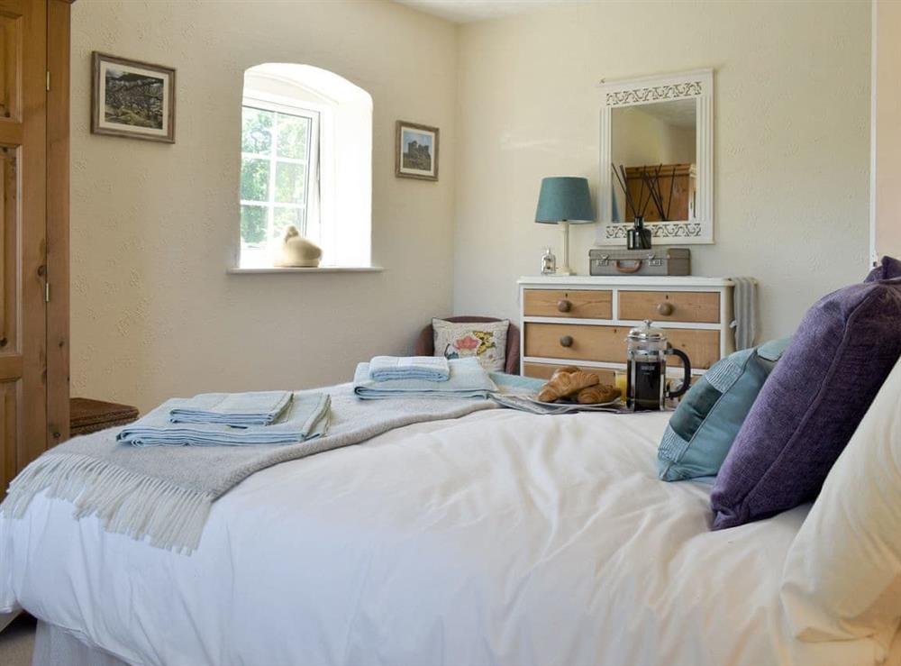 Double bedroom (photo 3) at Beech Tree Cottage at Blackaton Manor Farm in Widecombe-in-the-Moor, Devon