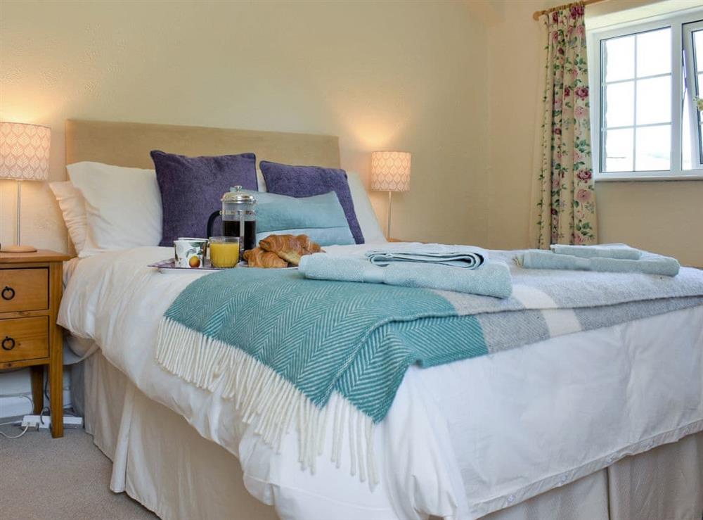 Double bedroom at Beech Tree Cottage at Blackaton Manor Farm in Widecombe-in-the-Moor, Devon