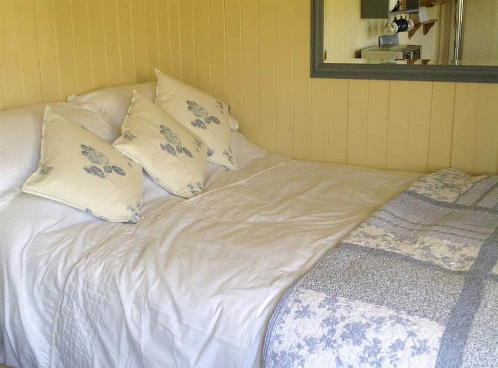 Double bedroom at Beeches Shepherd Hut in Harleston, Suffolk