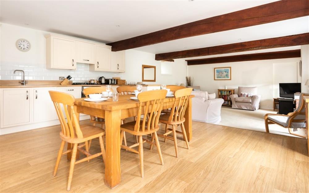 Open plan kitchen diner, leading into the cozy living area. at Beeches in Slapton