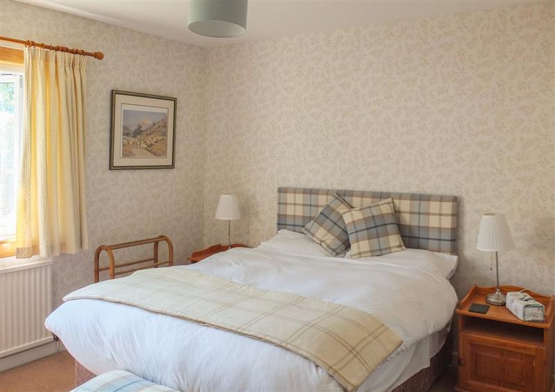 A bedroom in Beechwood Cottage at Beechwood Cottage, Blair Atholl