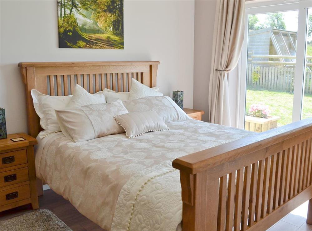 King Size Bed at Beehive Cottage in Denbigh, Denbighshire