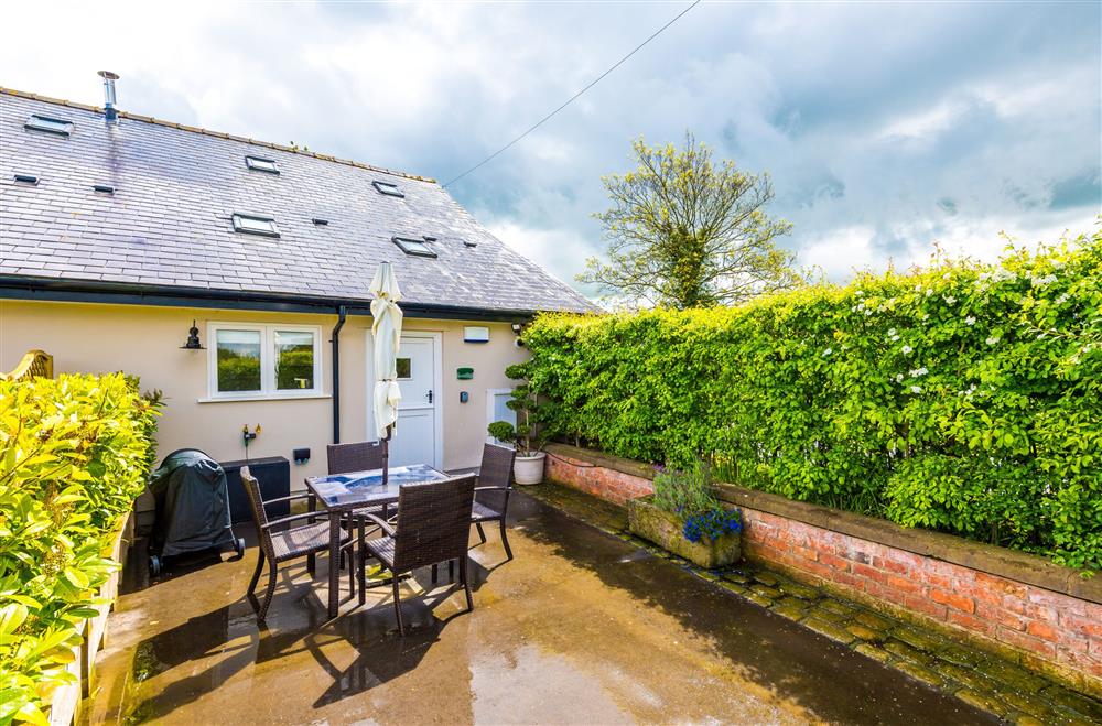 Enjoy alfresco dining in the front courtyard