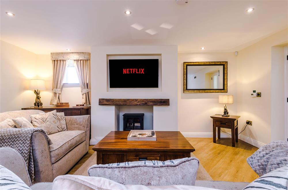 Sumptuous seating and a Smart television in the sitting room