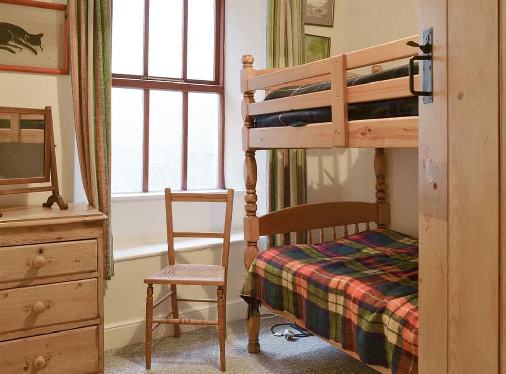 Comfortable bunk bedroom at Begbie Cottage in Bowness-on-Windermere, Cumbria