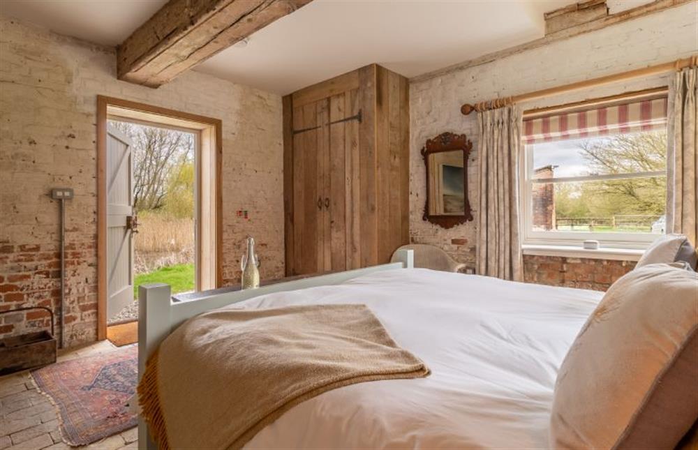 Bedroom with direct access to the pond at Belchamp Hall Mill, Belchamp Walter