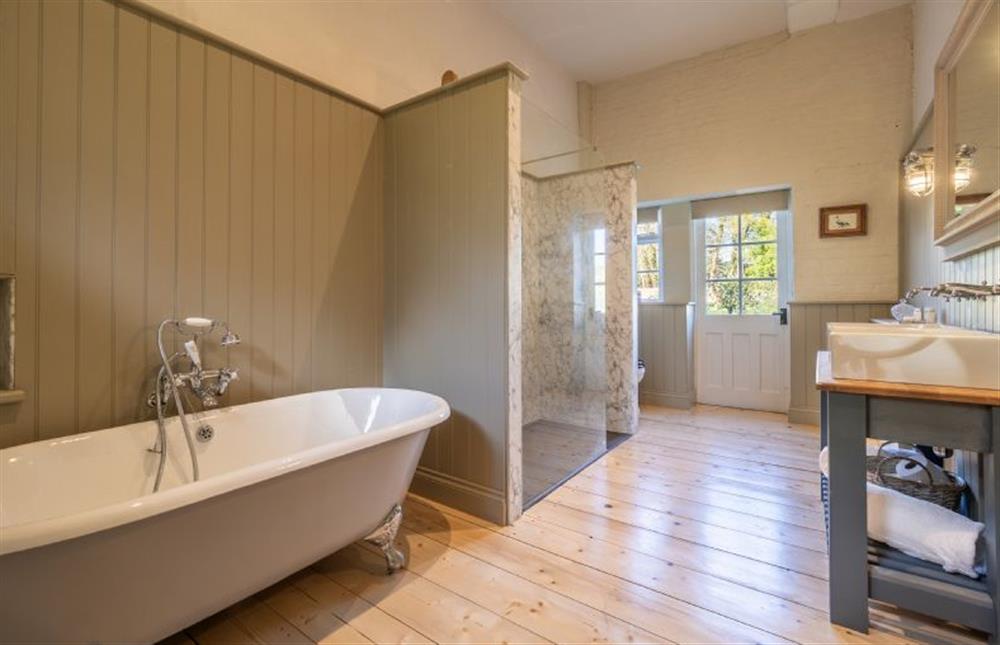 En-suite bathroom with free-standing bath at Belchamp Hall Stables, Belchamp Walter