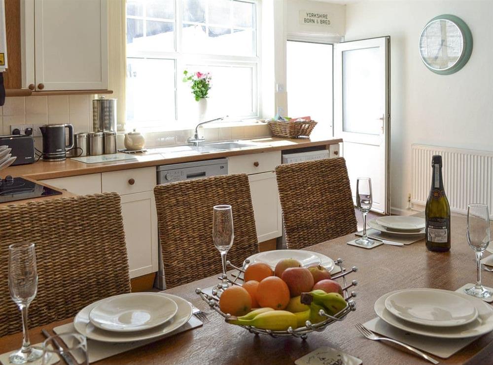 Convenient dining area within the kitchen at Belfrey House in York, North Yorkshire