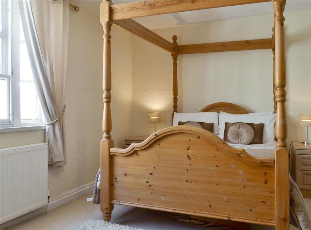 Relaxing four poster bedroom at Belfrey House in York, North Yorkshire