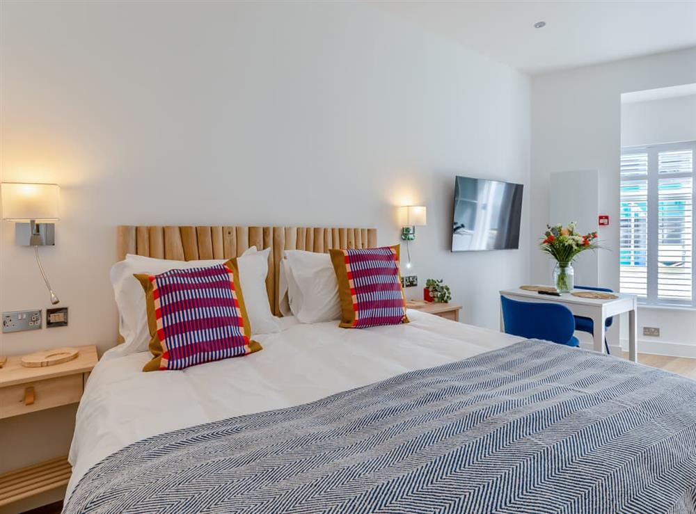 Bedroom area (photo 3) at Belgrave Sands Apartment 2 in Torquay Seafront, Devon