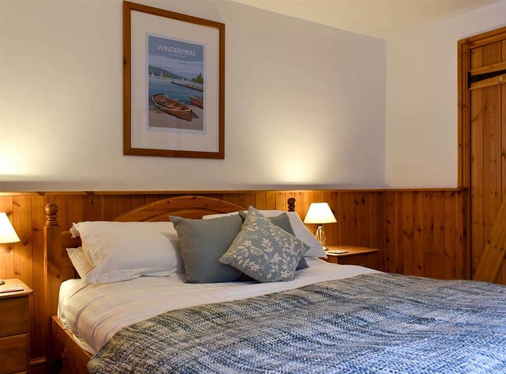 Relaxing bedroom with kingsize bed at Bell Hill Cottage in Lindale, near Grange-over-Sands, Cumbria