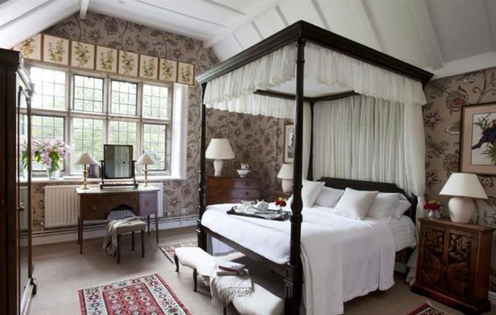 Double bedroom with four-poster bed at Belle Isle Castle, Enniskillen